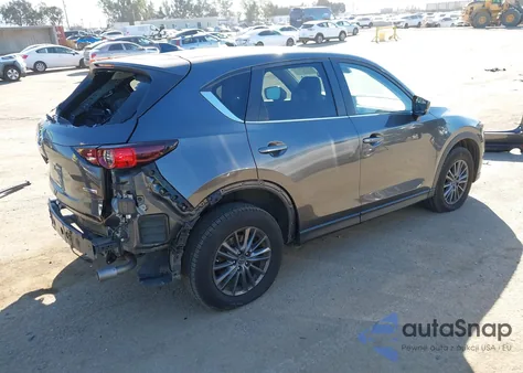 2020 Mazda Cx-5 Touring z USA, uszkodzony, nr VIN JM3KFACM5L0800140